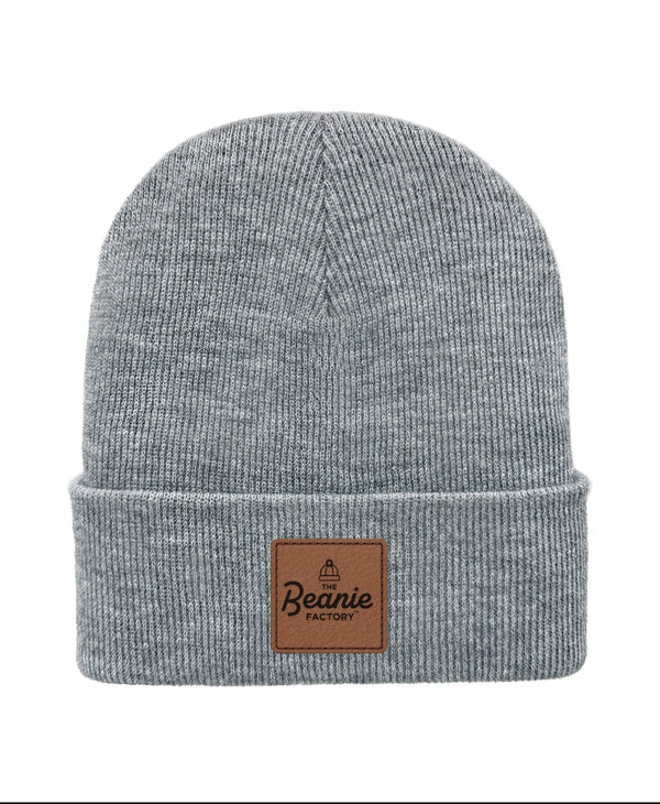 Gray beanie with a brown leather patch on a white background